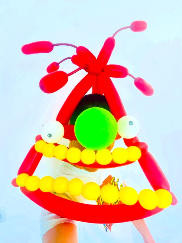 sculpteur de ballon paris 78 masque rouge nez vert